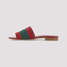 Red and green Gucci Jane slide sandals showing leather outsole, bottom view