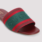 Red and green Gucci Jane slide sandals showing leather insole detail