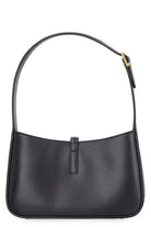 Saint Laurent Le 5 à 7 bag showing aged gold-tone hardware detail