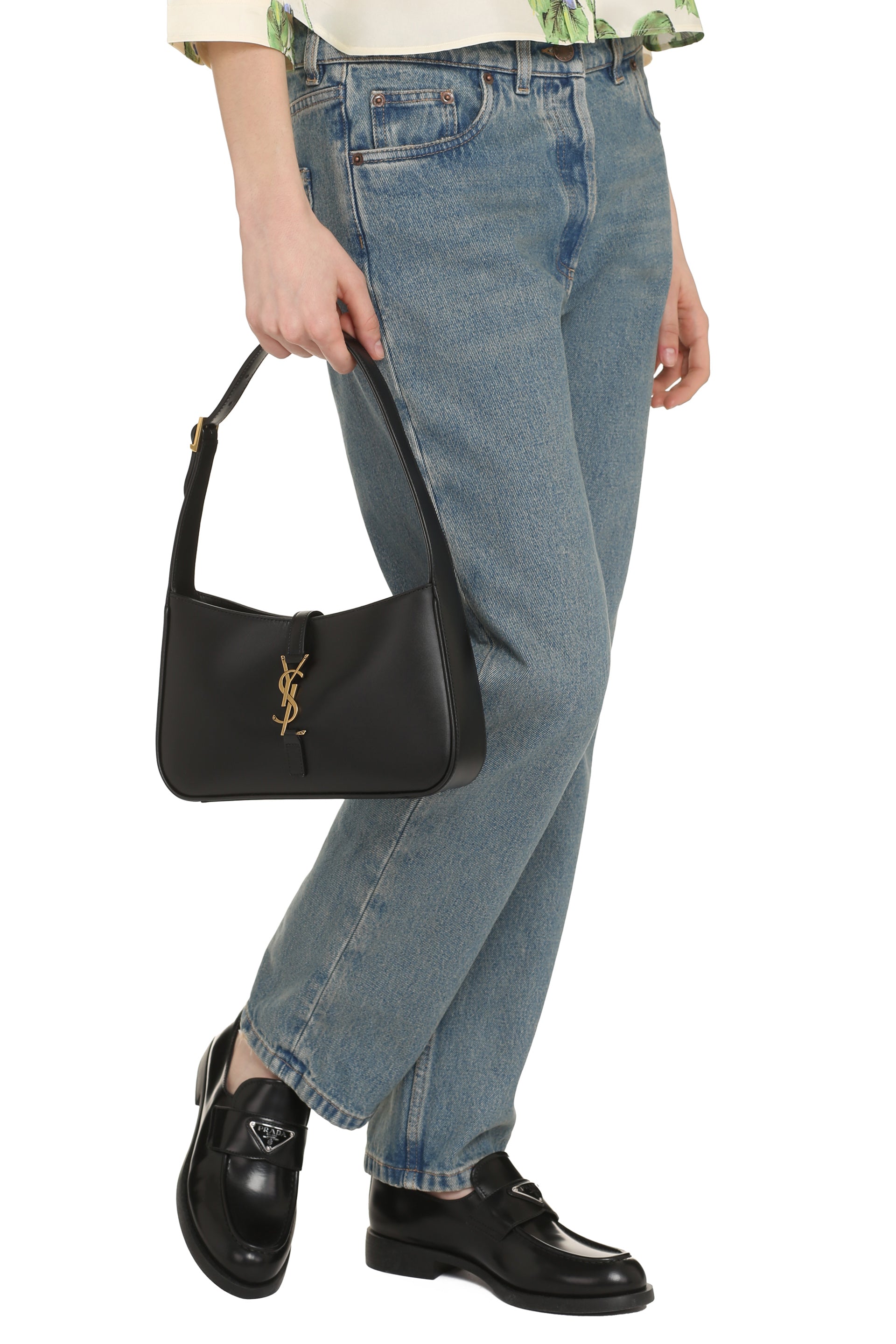 Saint Laurent shoulder bag interior showing zippered pocket compartment