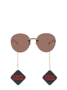 TIGER GLASSES WITH PENDANT Gucci