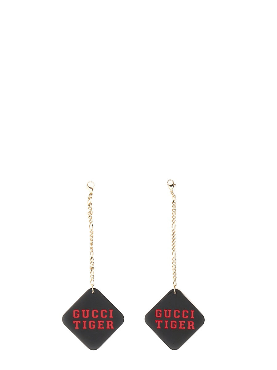 TIGER GLASSES WITH PENDANT Gucci