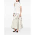 White sleeveless top with asymmetric cowl neckline by Niccolò Pasqualetti, detail view