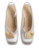 ADAMANTINE SLINGBACK PUMPS Valentino Garavani