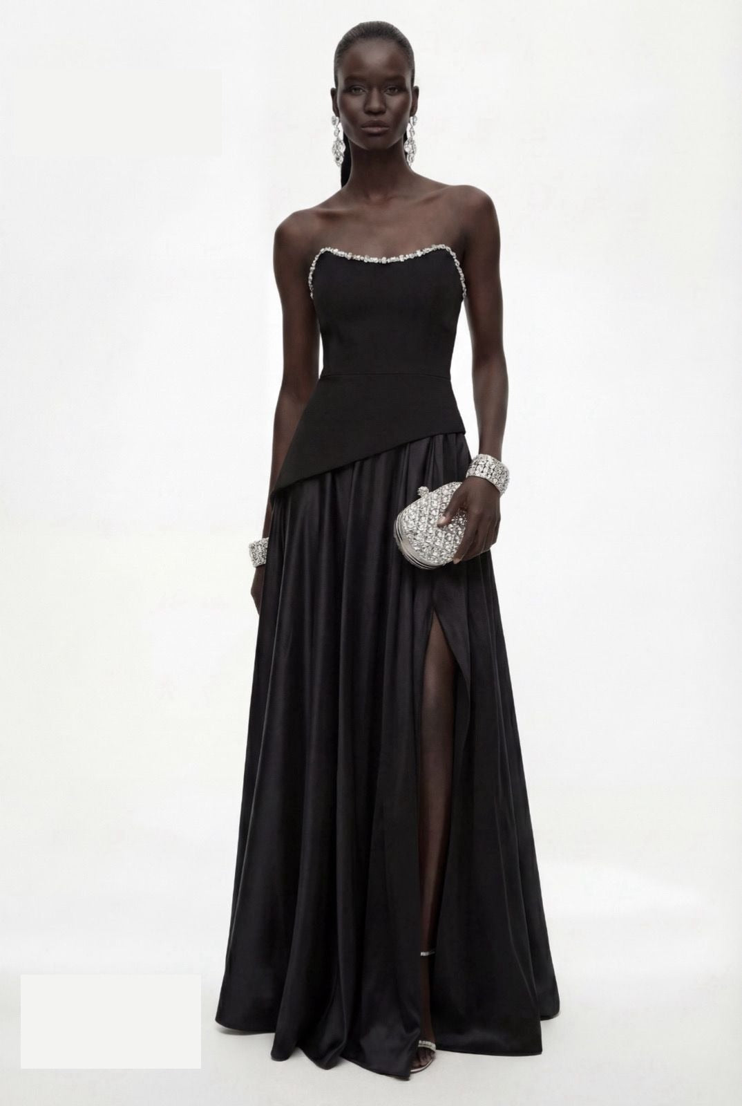 Black satin gown with asymmetric peplum and thigh split, side angle by Lord & Taylor Heritage