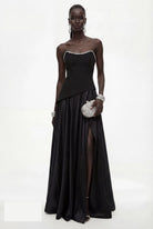 Black satin gown with asymmetric peplum and thigh split, side angle by Lord & Taylor Heritage