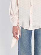 SILK SHIRT WITH KNOTTED CUFFS Balenciaga