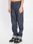 DENIM TROUSERS WITH HEM DETAILS Gucci