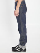 DENIM TROUSERS WITH HEM DETAILS Gucci