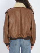BOMBER JACKET IN HAMMERED LEATHER AND SHEARLING Saint Laurent