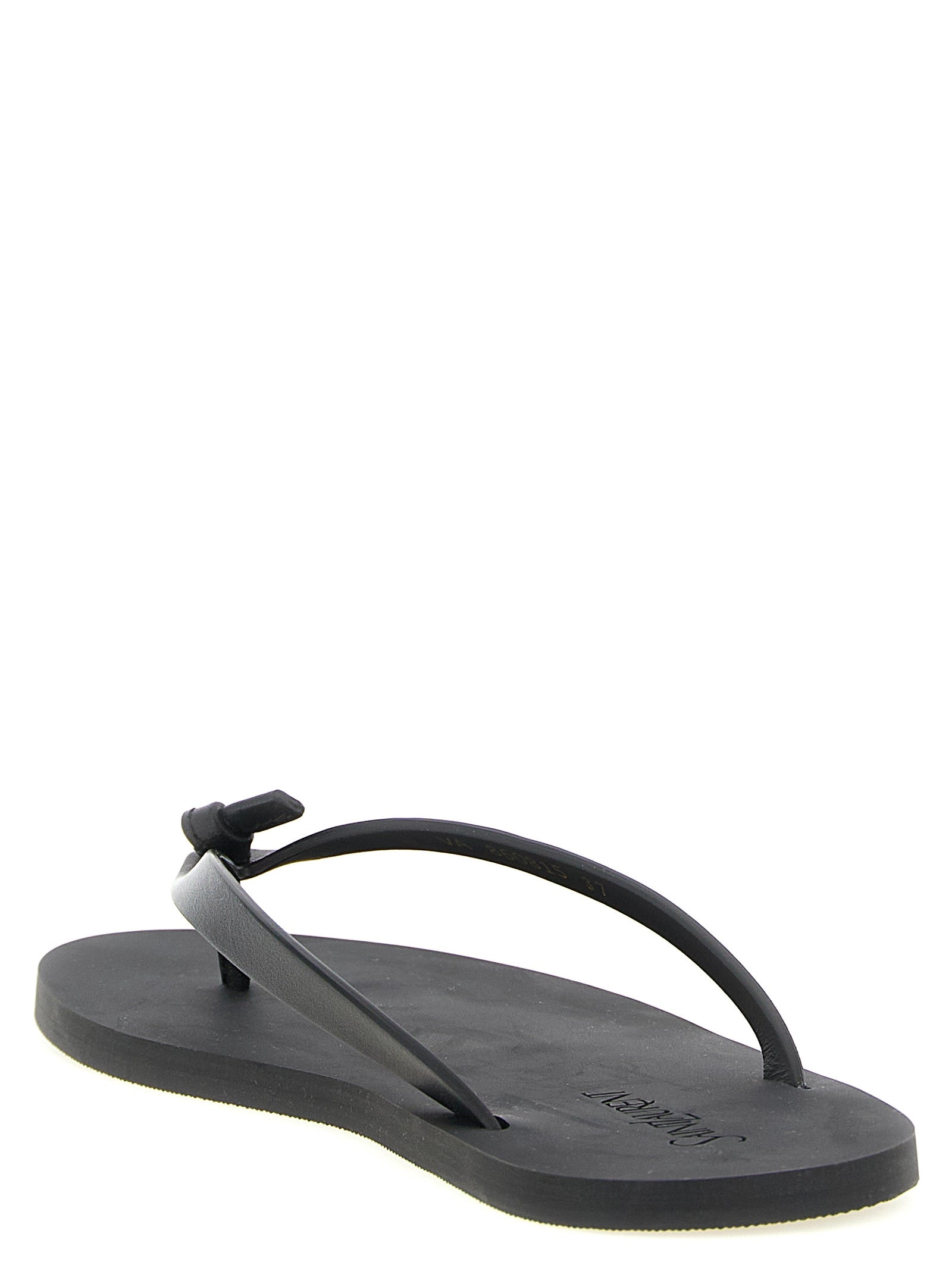 Black leather Pool flip flops by Saint Laurent, top view showing gold embossed logo