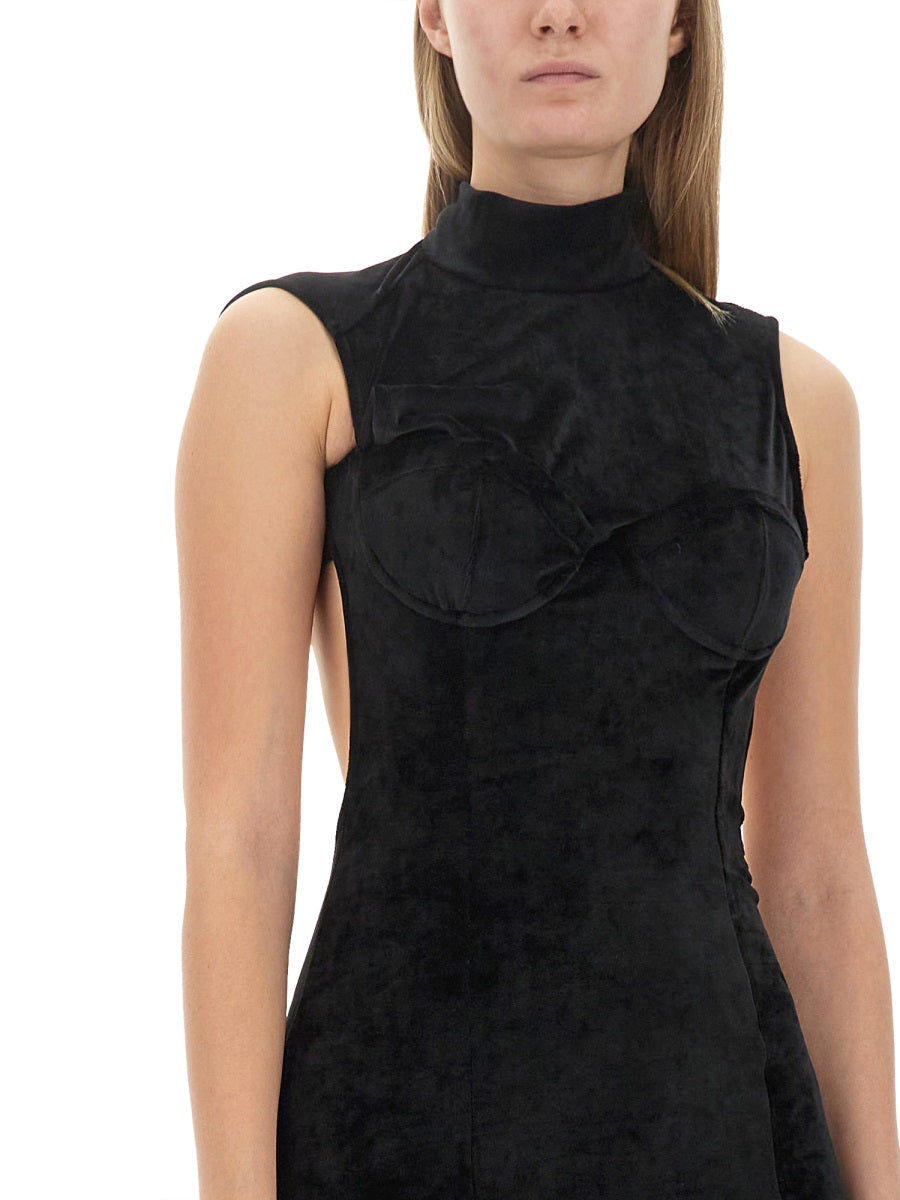 Black GCDS mini dress with turtleneck on model, back view