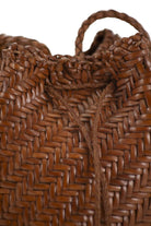POMPOM DOUBLE JUMP - BUCKET BAG WITH WOVEN LEATHER Dragon