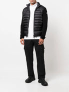 PADDED JACKET WITH KNITTED SLEEVES Moncler