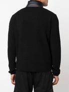 PADDED JACKET WITH KNITTED SLEEVES Moncler