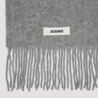 CARRO SCARF WITH FRINGES Jacquemus