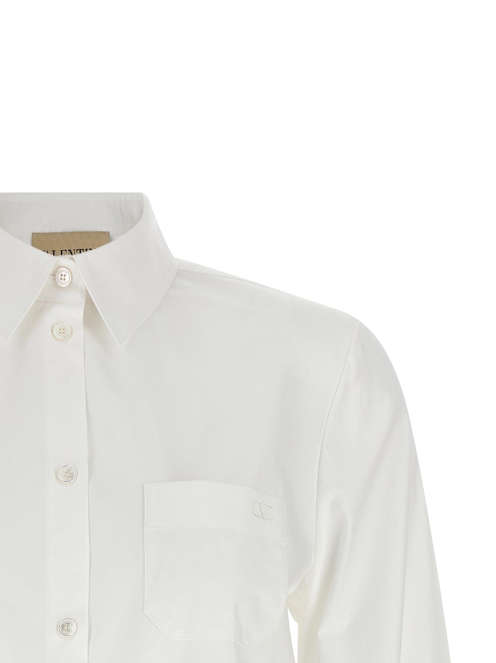 White Valentino Garavani cotton shirt, side view with wide sleeves