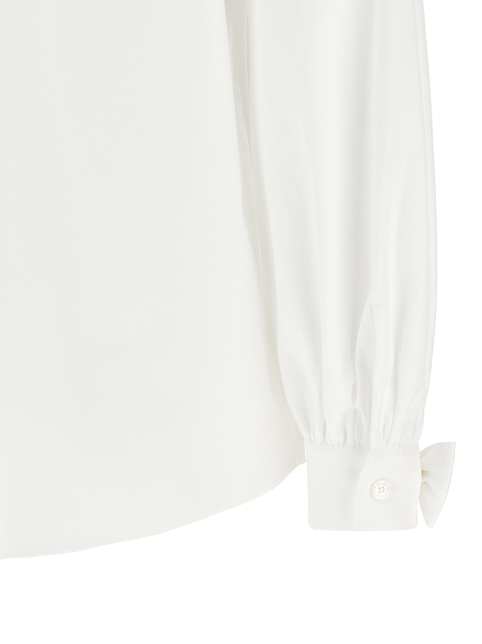 White poplin shirt by Valentino Garavani, detail of curled cuffs