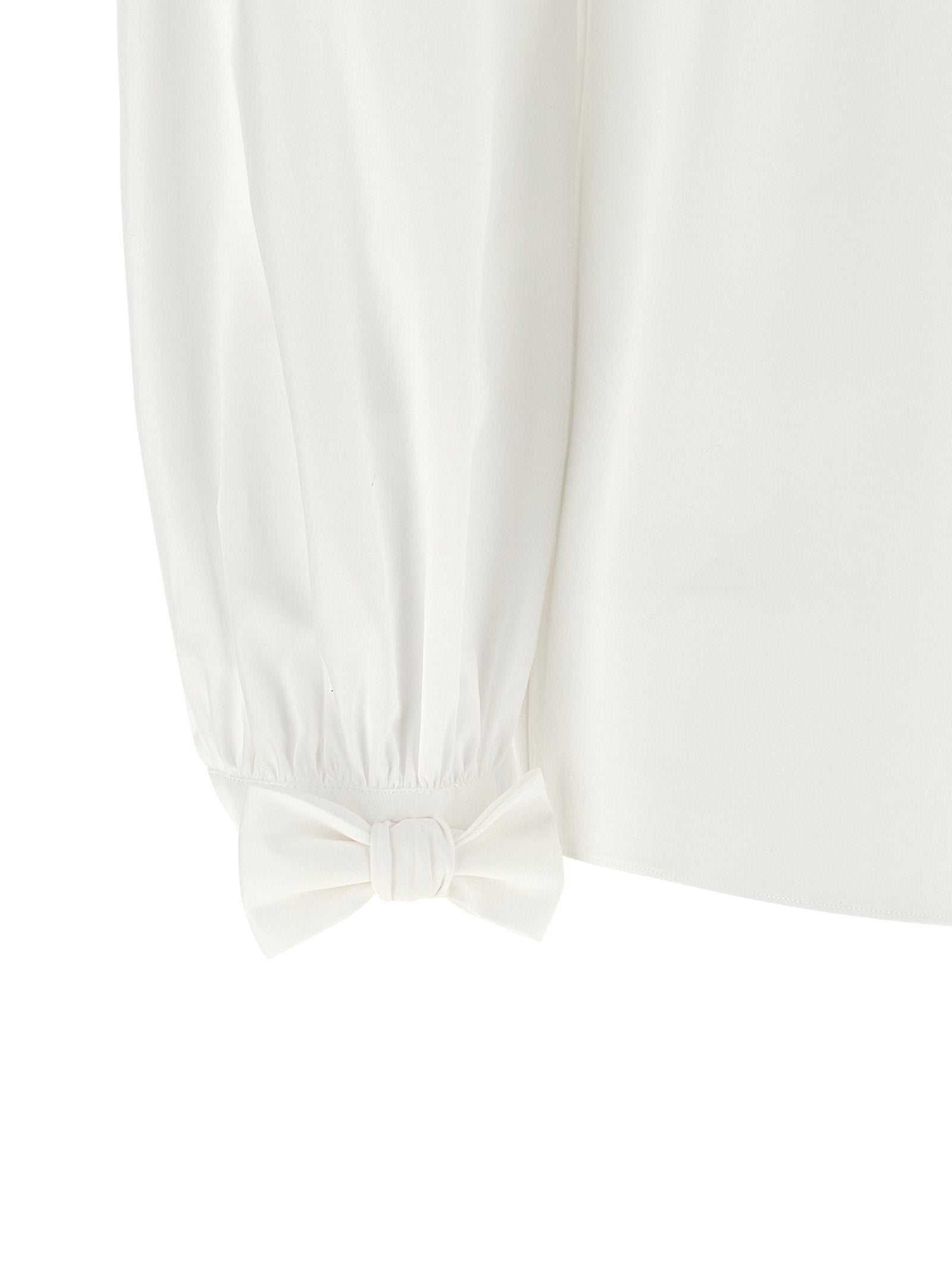 White Valentino Garavani shirt, close-up of VLogo Signature embroidery on pocket