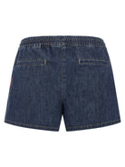Blue chambray denim shorts with contrast piping, side view by Valentino Garavani