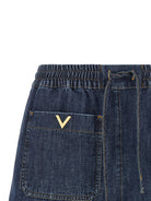 Blue chambray denim shorts with elastic waistband, back view by Valentino Garavani