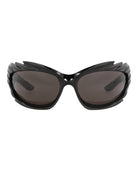 Black geometric shield sunglasses with spike detail by Balenciaga, front view