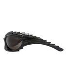 Balenciaga geometric sunglasses with saddle nose bridge, angled view