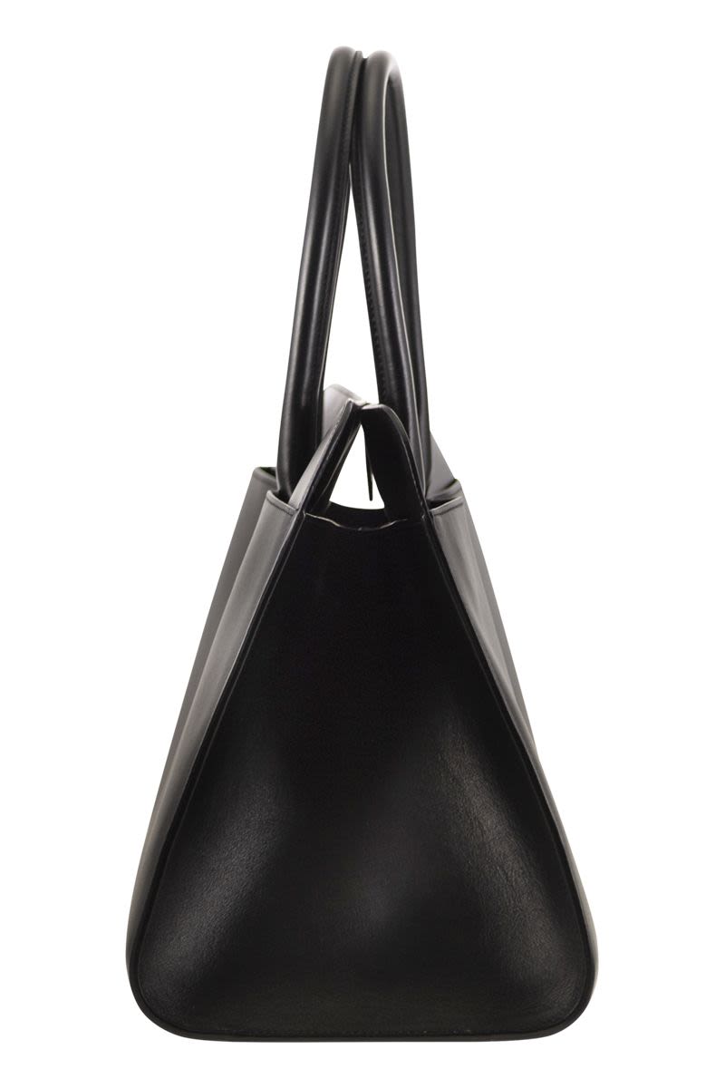 LARGE HANDBAG WITH METAL ACCESSORY Fabiana Filippi