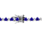 Sterling silver tennis bracelet with heart sapphires, box clasp detail
