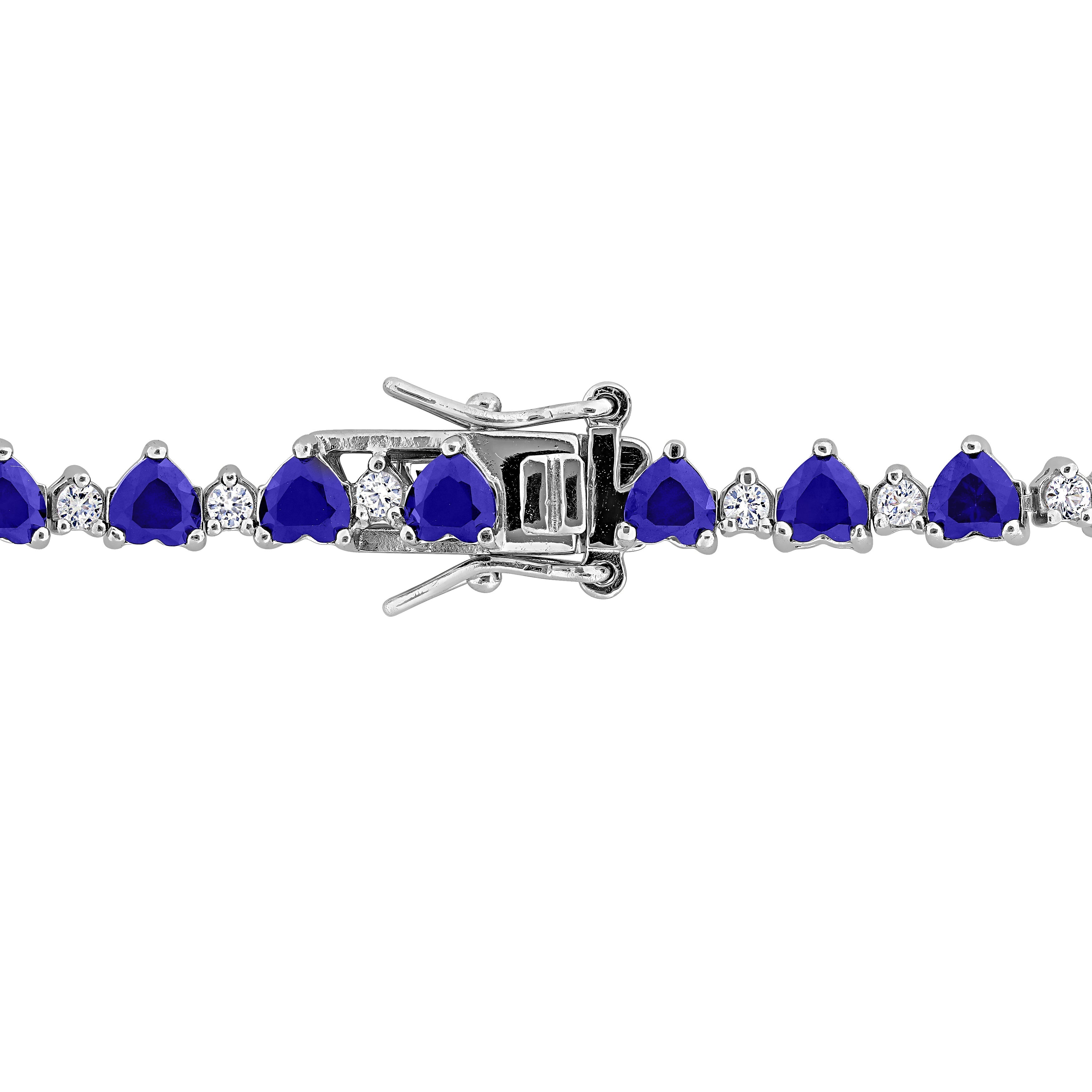 Sterling silver tennis bracelet with heart sapphires, box clasp detail