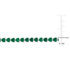 Trillion-cut created emerald gemstones in sterling silver bracelet, close-up by Lord & Taylor