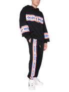 JOGGING PANTS WITH CUTE TAPE LOGO BAND GCDS