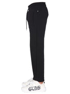 JOGGING PANTS WITH CUTE TAPE LOGO BAND GCDS