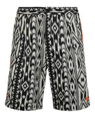 Black jacquard cotton shorts with tribal pattern by Marcelo Burlon, front view