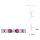 Ruby eternity ring prong setting detail by Lord & Taylor