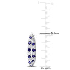 Blue sapphire hoop earrings detail view showing prong-set gemstones by Lord & Taylor
