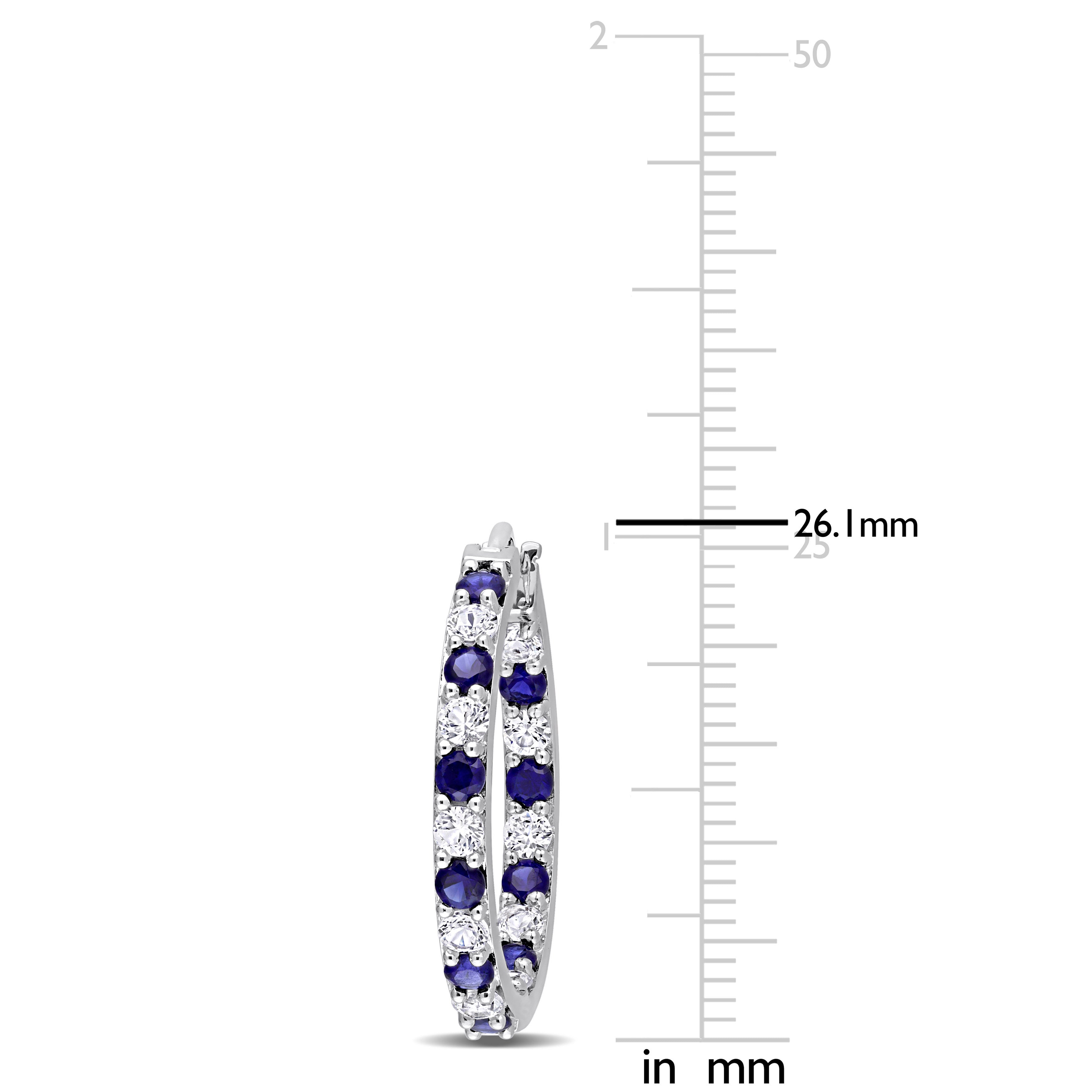 Blue sapphire hoop earrings detail view showing prong-set gemstones by Lord & Taylor