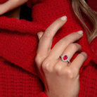 Red ruby cocktail ring in sterling silver worn on hand, lifestyle view by Lord & Taylor