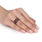 Smokey quartz gemstone cocktail ring with rose-tone plating, side view