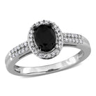 White gold oval halo engagement ring with black diamond by Delmar, front view