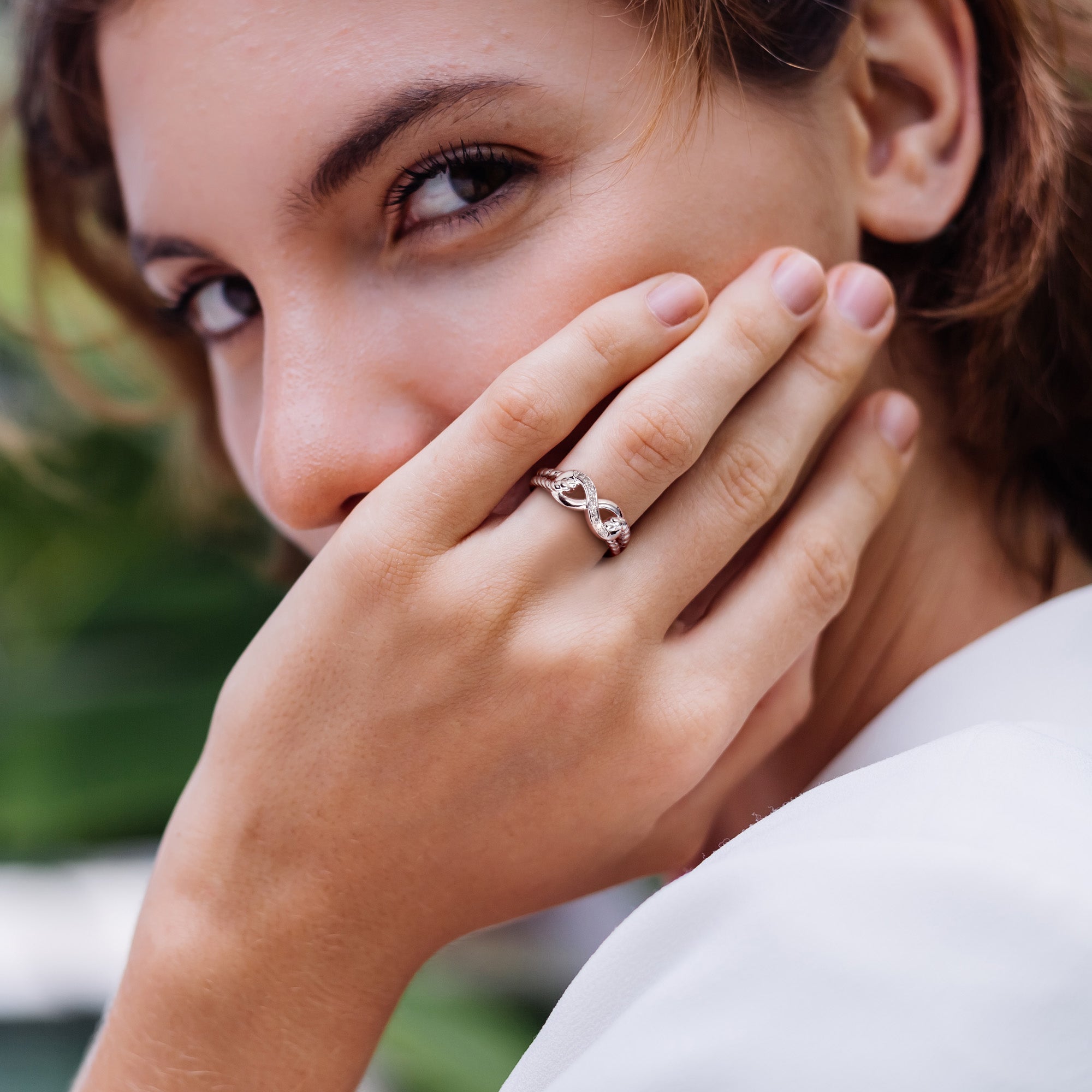 Lord & Taylor diamond infinity ring worn on hand