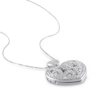 Close-up detail of round-cut diamonds on heart locket pendant