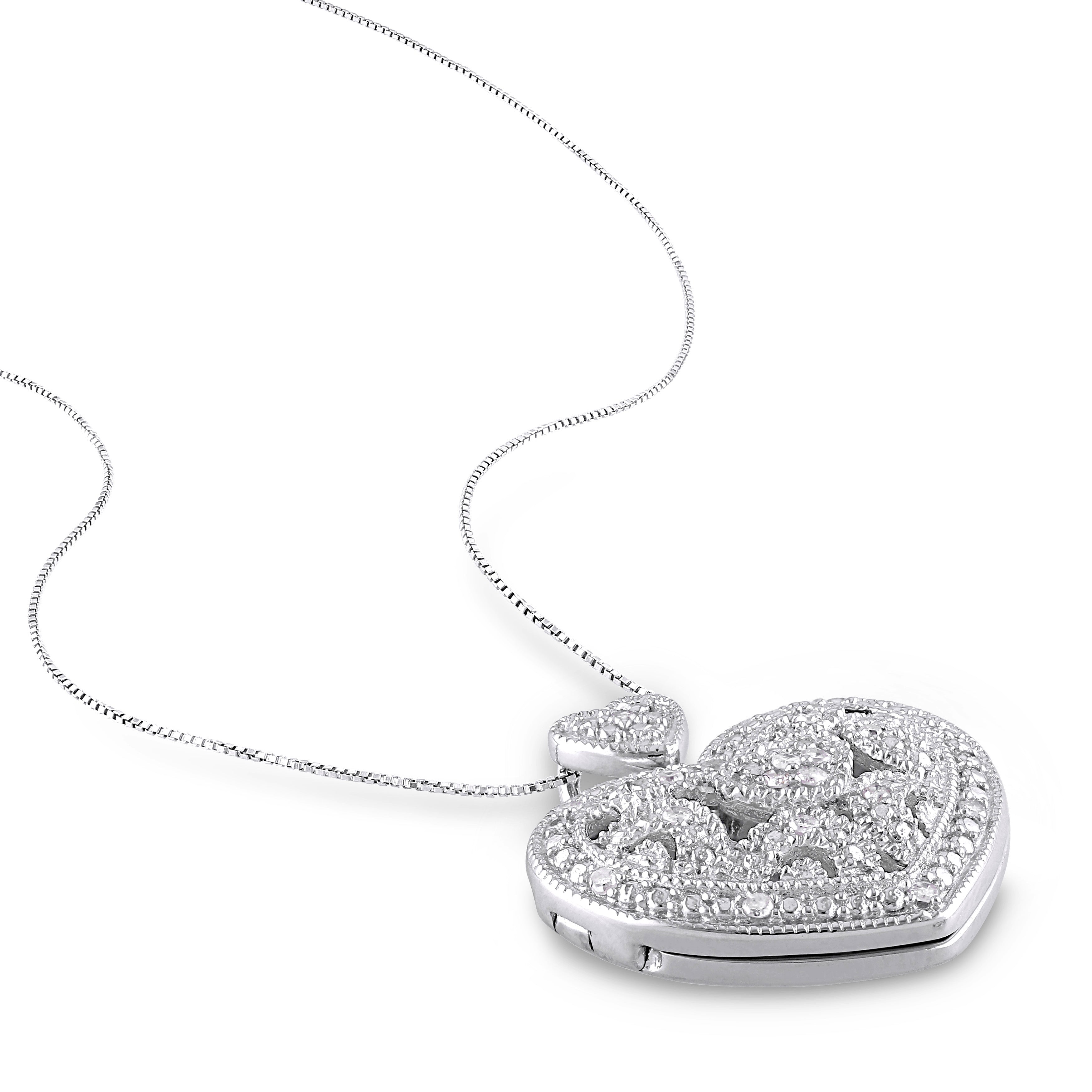 Close-up detail of round-cut diamonds on heart locket pendant