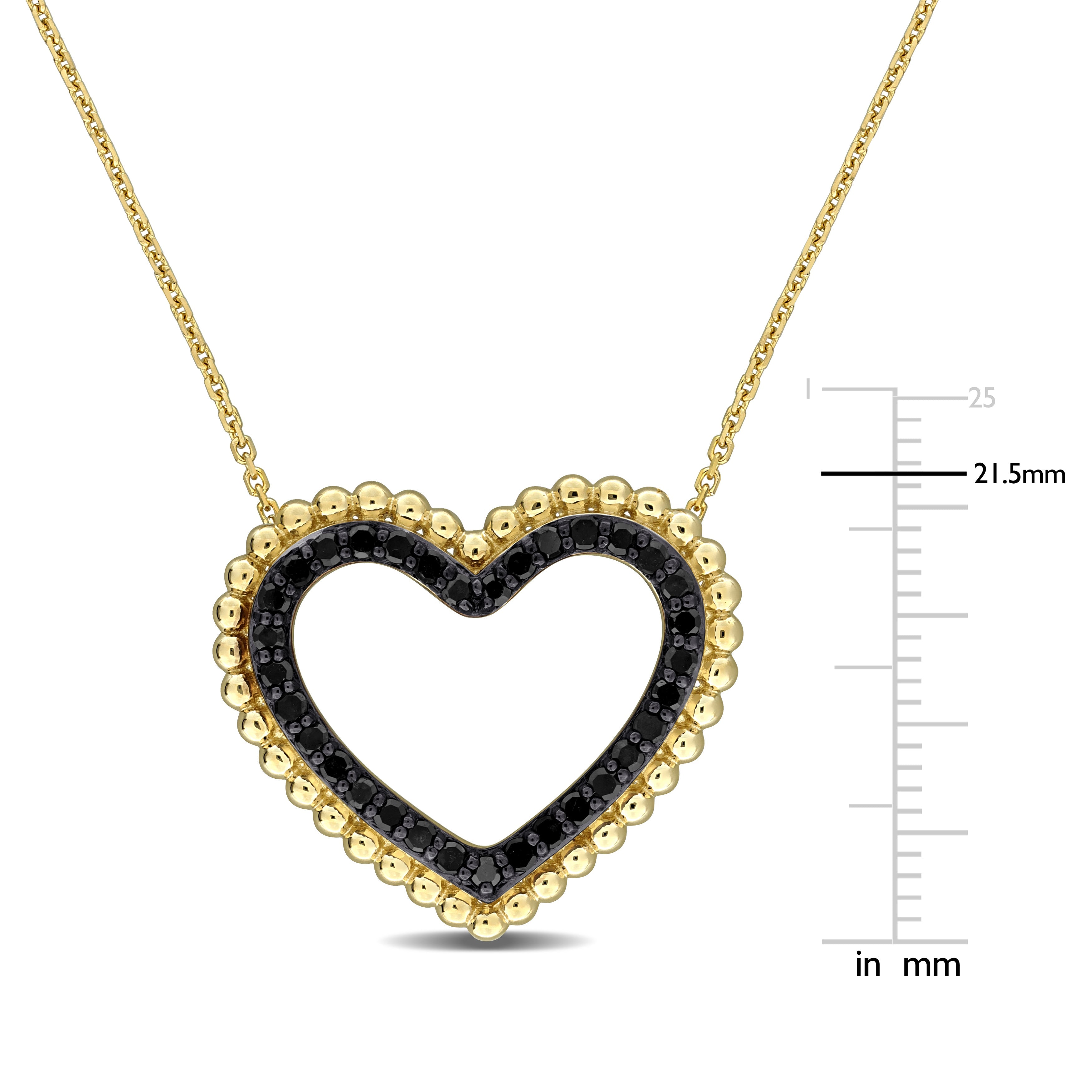 Close-up of black diamond heart pendant showing beaded detailing and rhodium accents