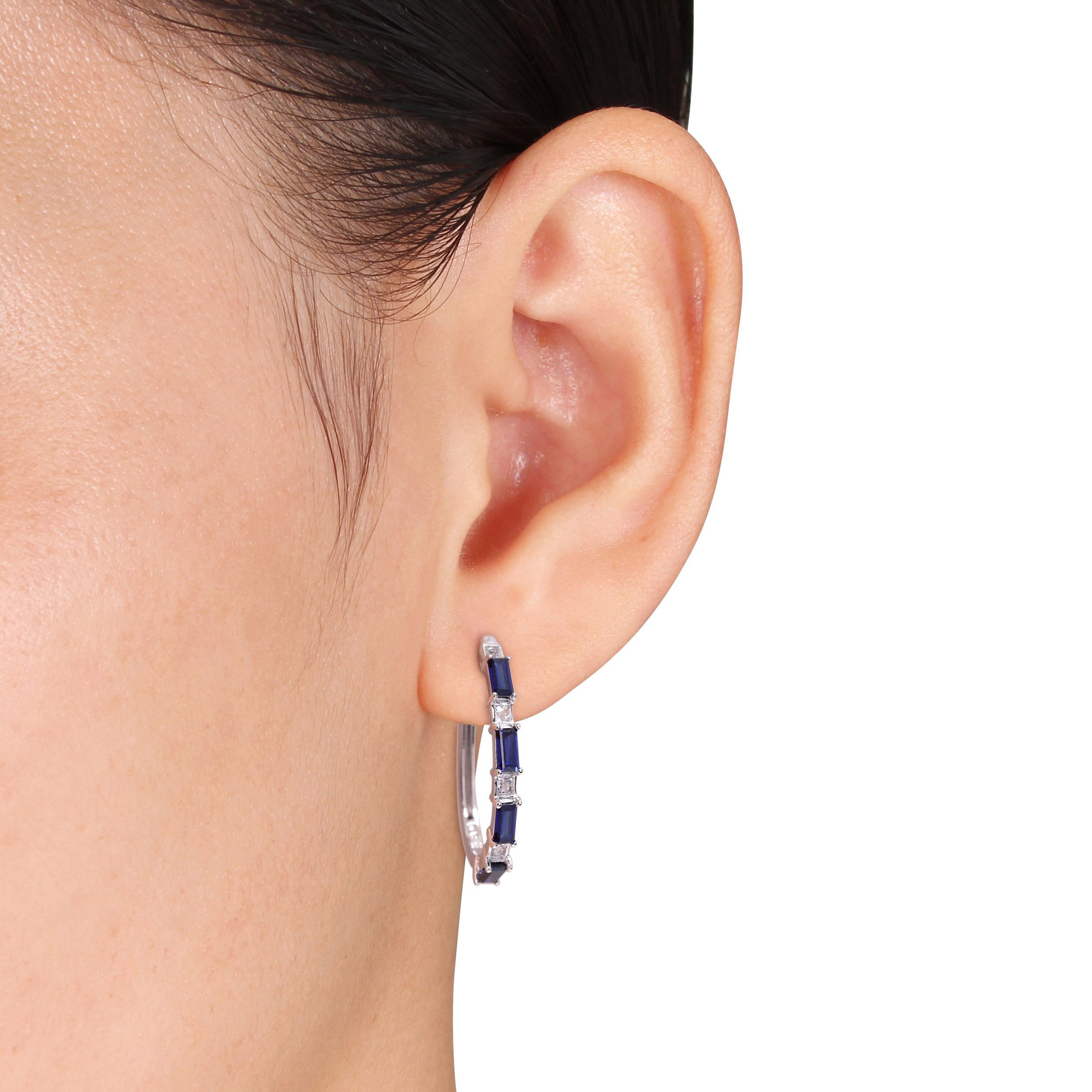 Sterling silver sapphire hoop earrings showing alternating gemstone pattern, side angle by Lord & Taylor