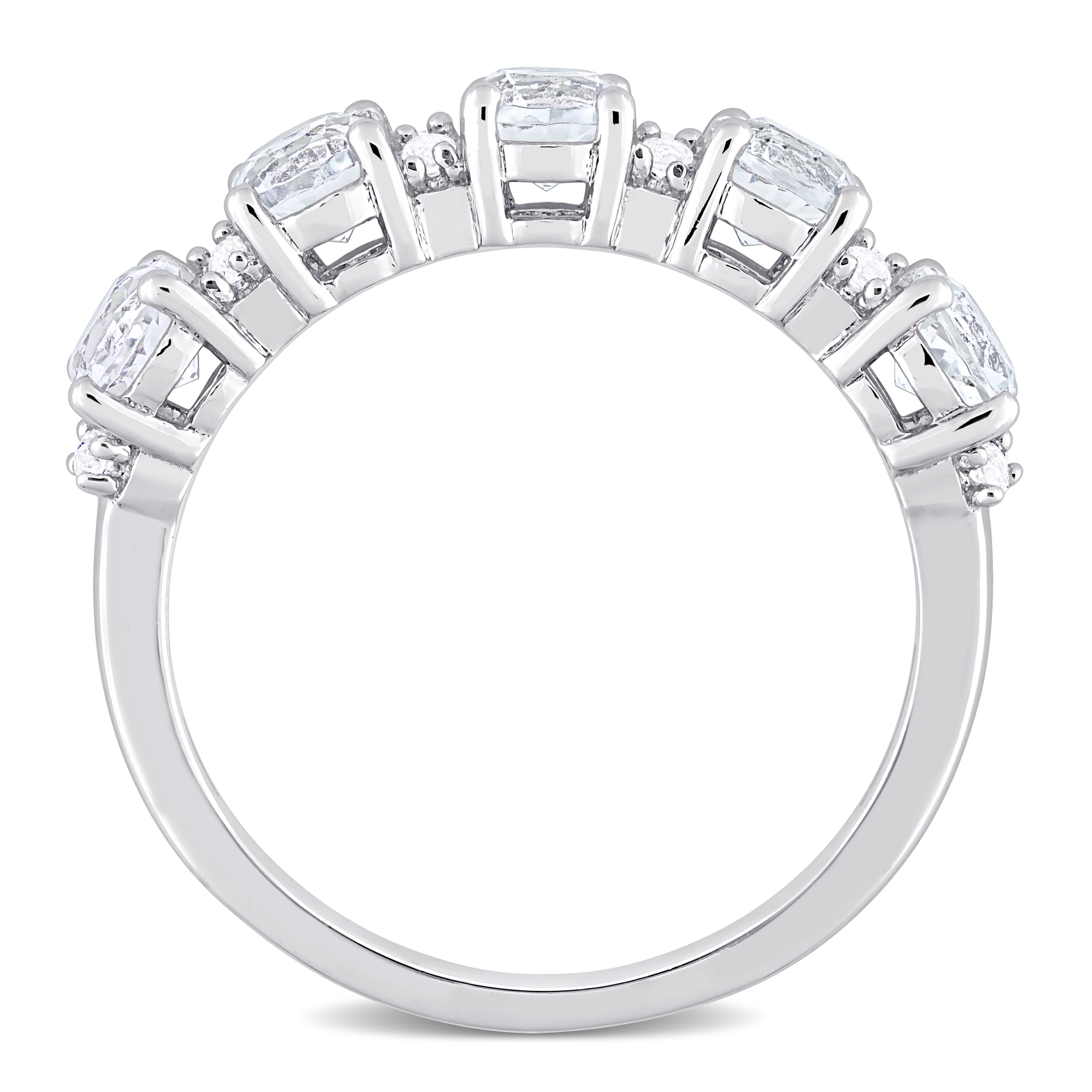 Sterling silver semi-eternity ring with white topaz, diagonal overhead view