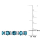 Blue topaz semi-eternity ring in sterling silver, side angle