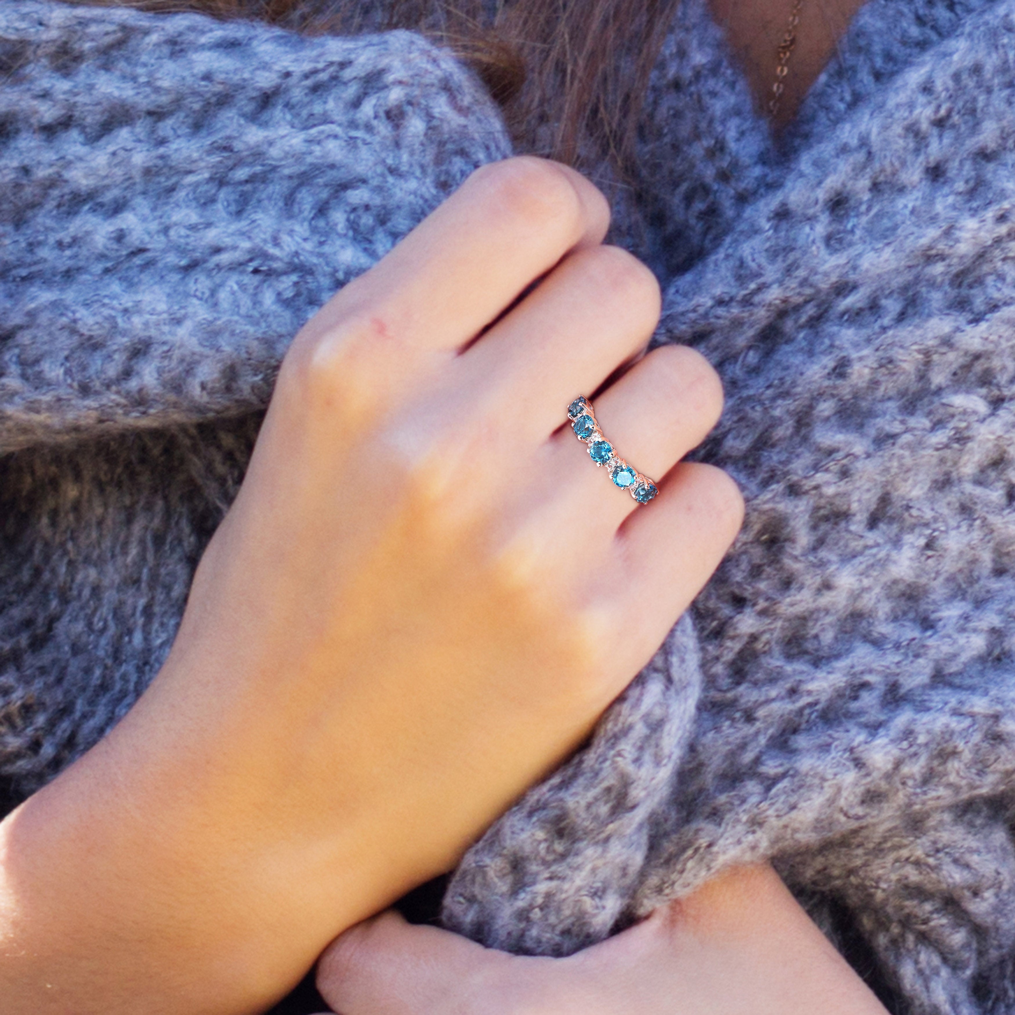 Blue topaz gemstone ring by Lord & Taylor, worn on hand