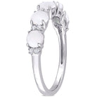 Sterling silver opal and white topaz ring by Delmar, side profile