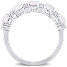 Sterling silver opal and white topaz ring by Delmar, angled view